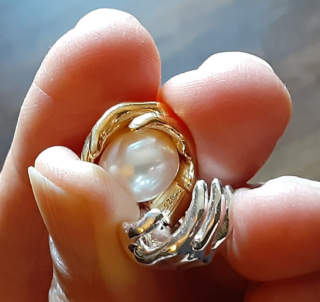 Empowerment Necklace next to a plant for a natural vibe