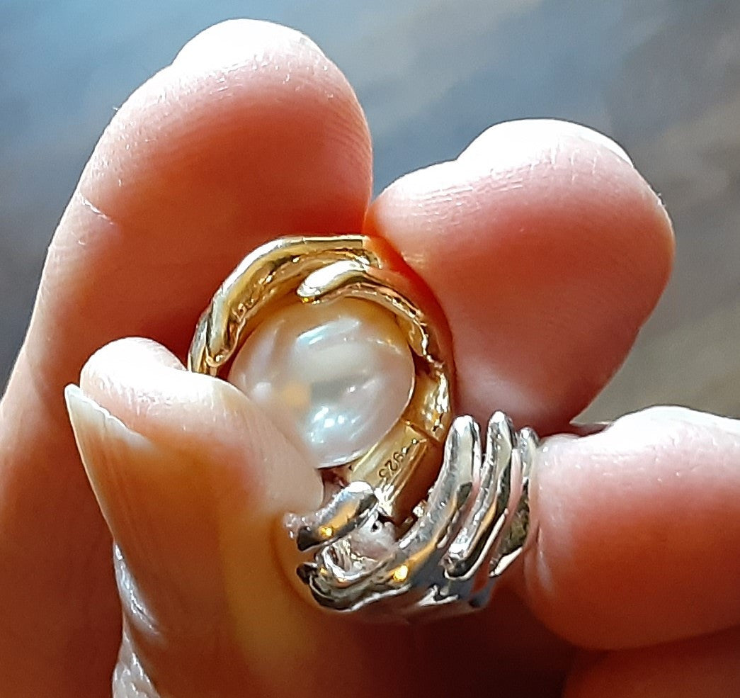 Empowerment Necklace next to a plant for a natural vibe