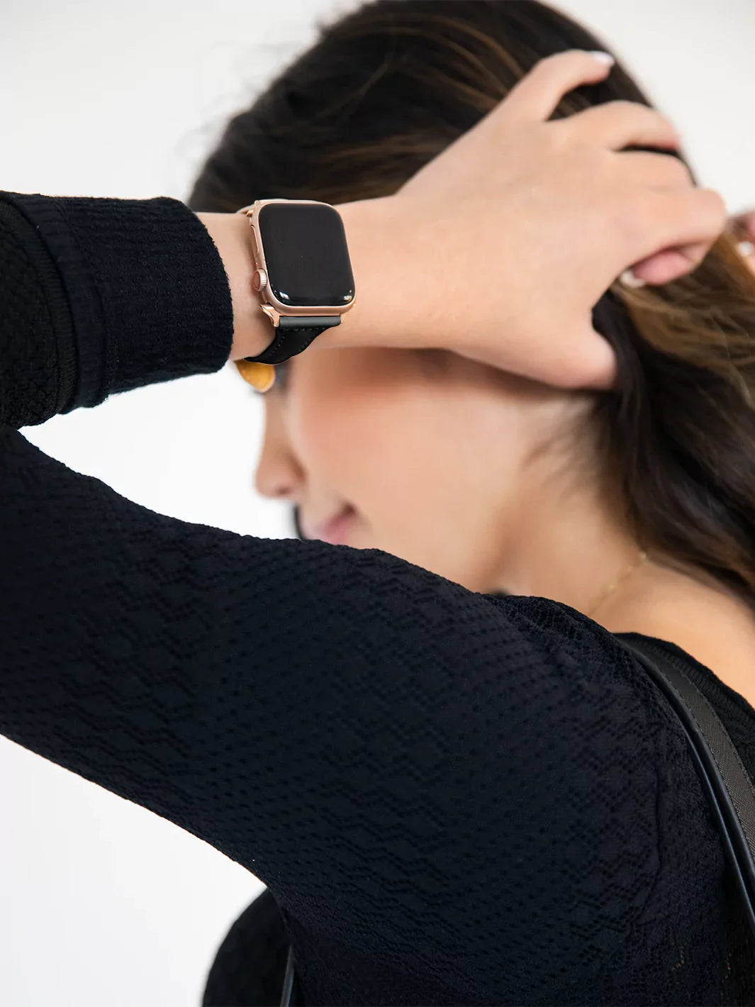 Lifestyle shot of the Sleek Black Leather Apple Watch Band in use