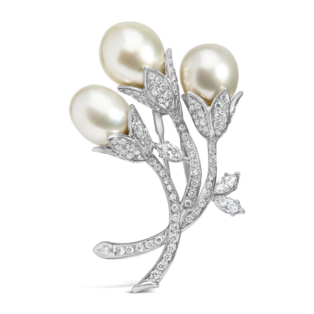 Side view of the stunning 18K White Gold Floral Brooch adorned with diamonds