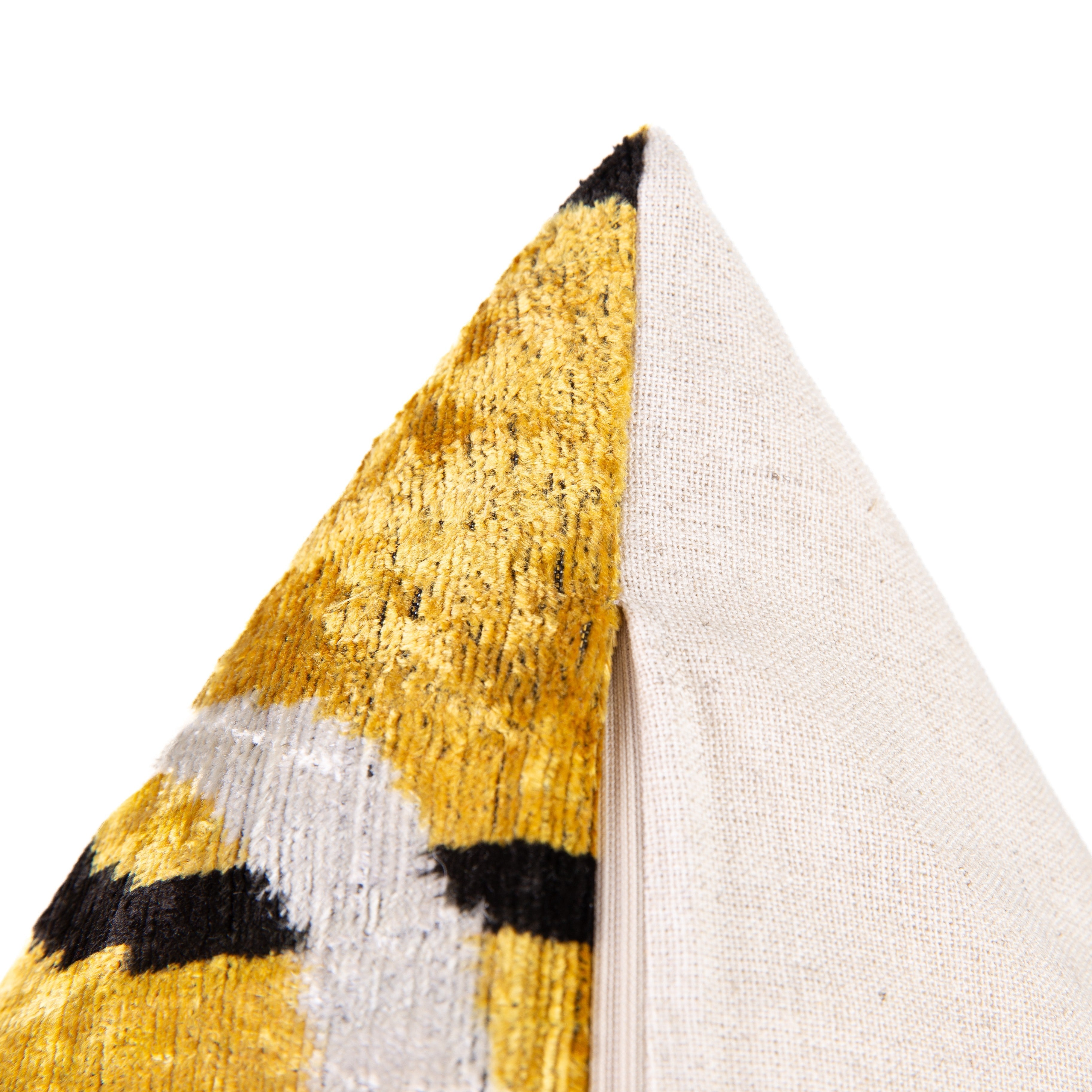 Lifestyle shot of Canvello's Velvet Throw Pillow in a cozy living room setting