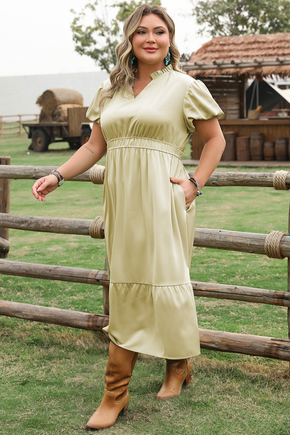 Back view highlighting the tiered skirt of Plus Size Notched V Neck Maxi Dress in Laurel Green