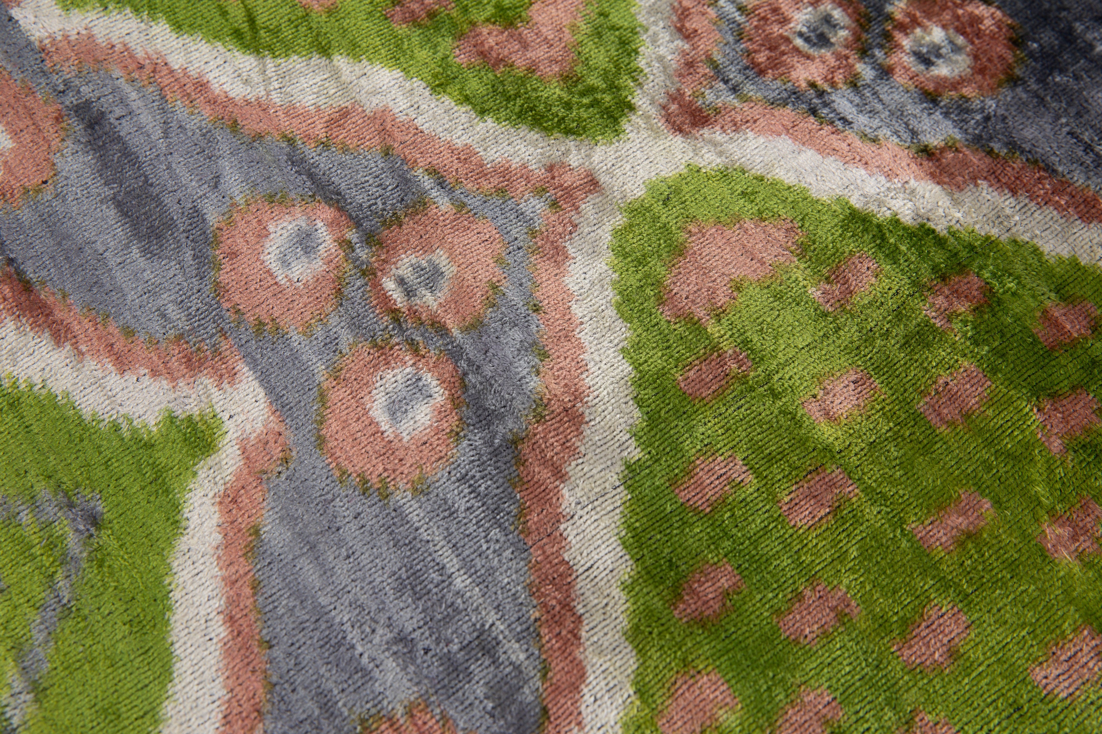 Lifestyle shot of the 20x20 Handmade Velvet Ikat Throw Pillow in a cozy living room