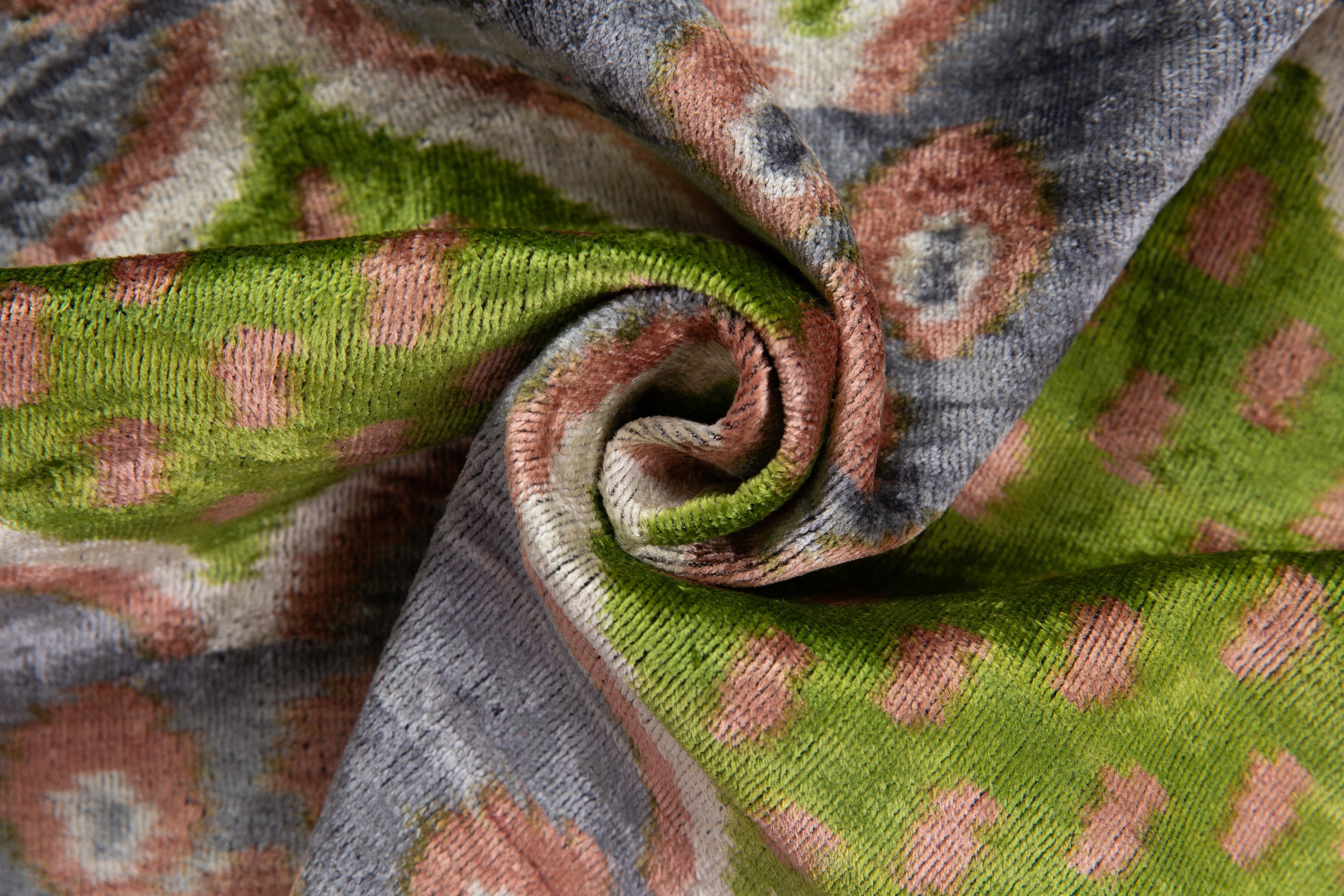 Side view showcasing the ikat pattern of the Handmade Velvet Ikat Throw Pillow