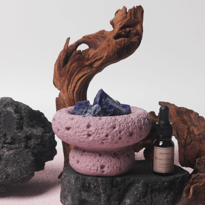 Stylish Purple Moon Essential Oil Diffuser set in a serene home environment