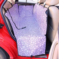 PetSafe Car Hammock Seat Cover in a car with a dog resting comfortably