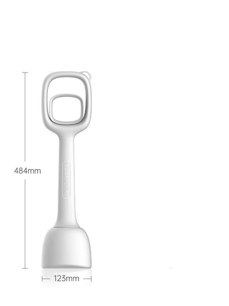 Pet Poo Picker-Upper displayed in an outdoor setting with a dog