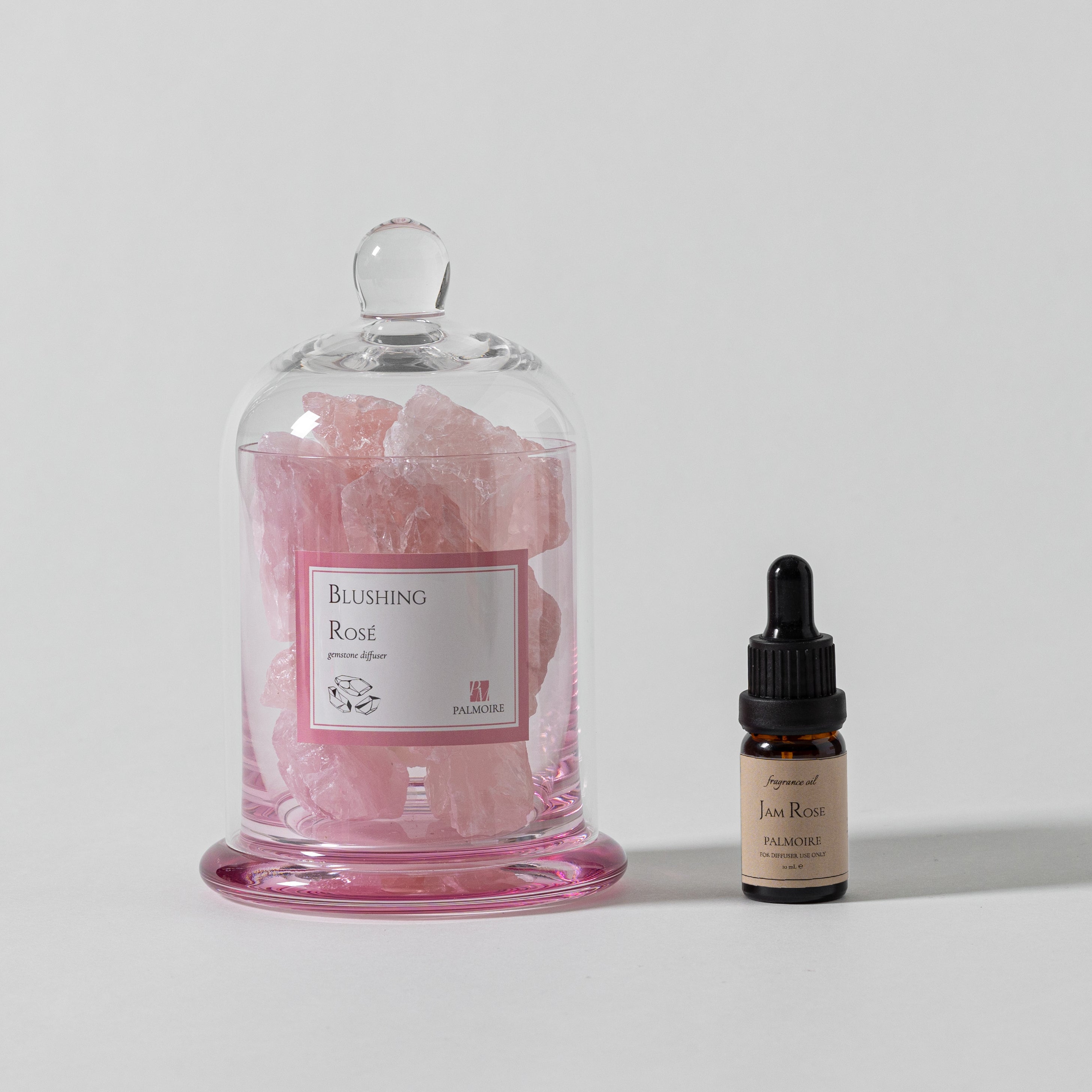 Stunning Blushing Rosé Gemstone Diffuser by Palmoire on a wooden table