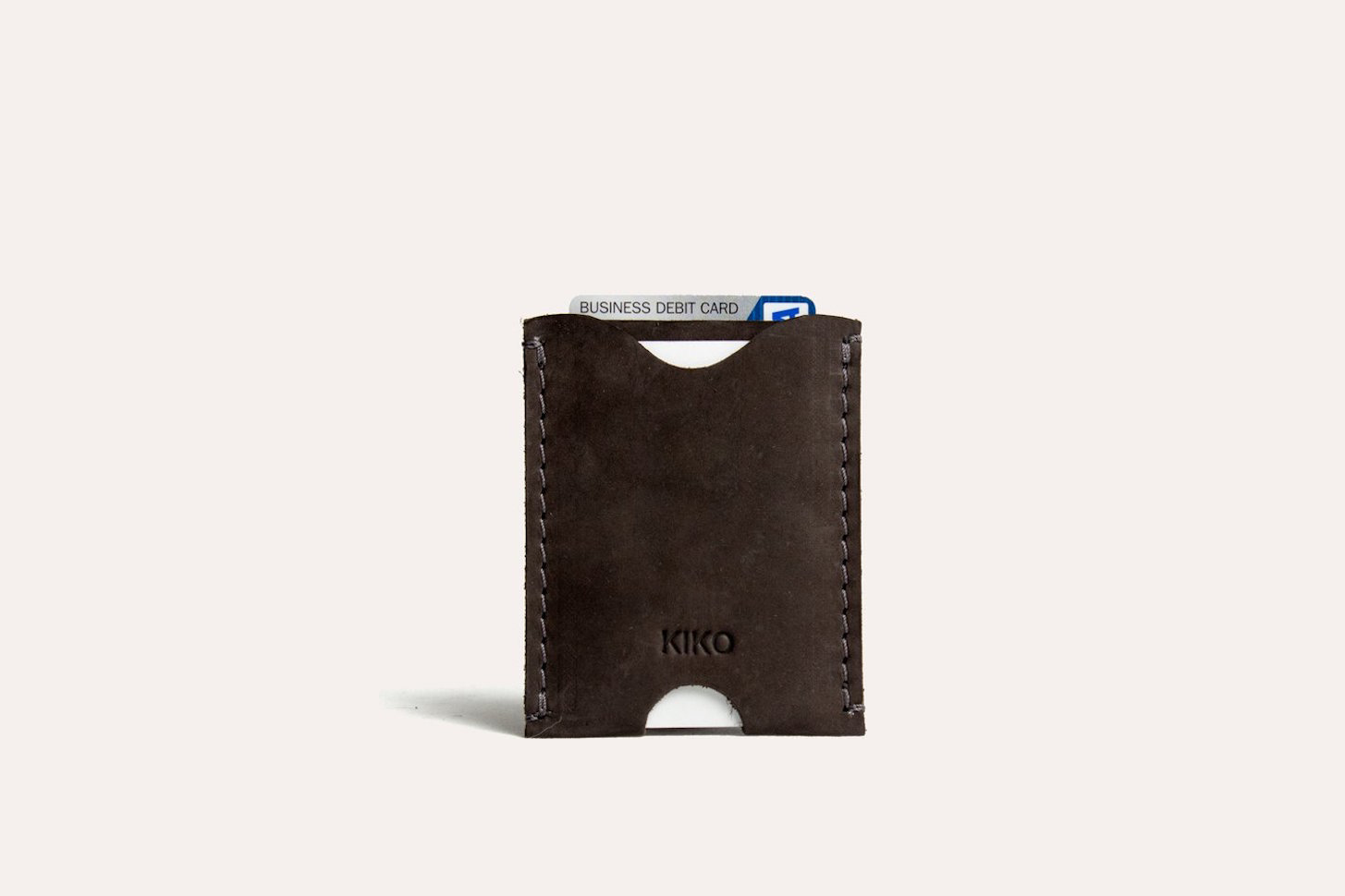 Side profile of Kiko Double Sided Cowhide Leather Card Holder in use