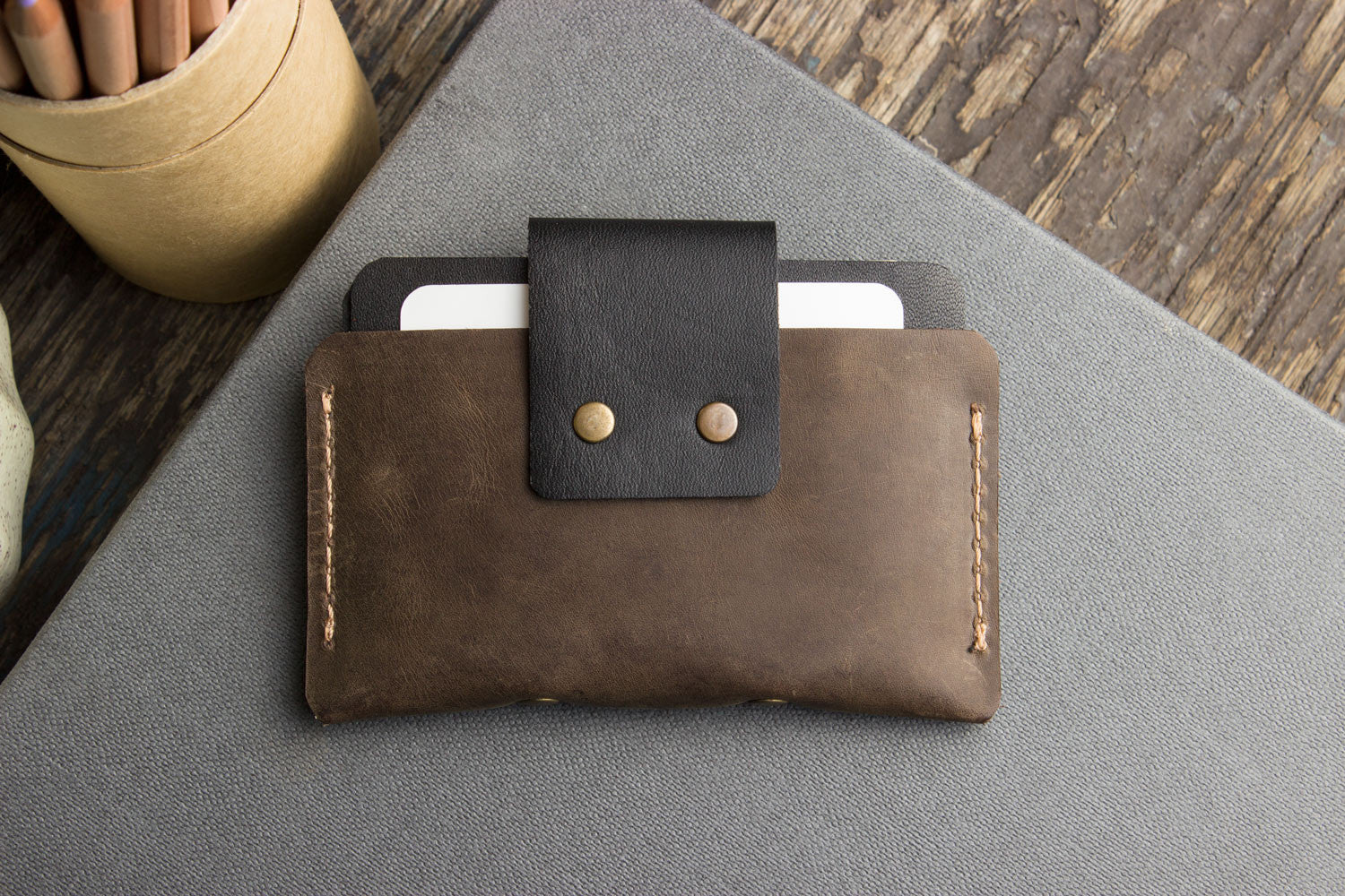 Kiko Two-Toned Leather Card Case with cards and cash neatly organized