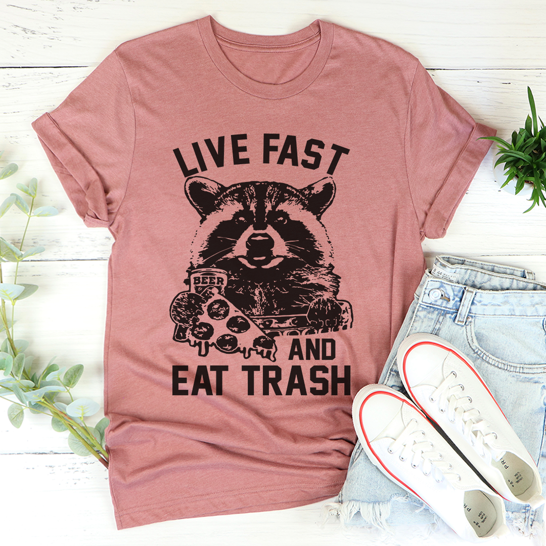 Lifestyle shot of model wearing Live Fast And Eat Trash T-Shirt in casual setting