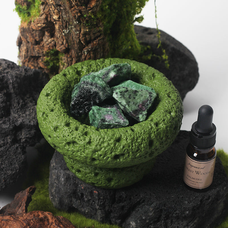 Green Moon Diffuser with Forest Woods aroma in a cozy living room