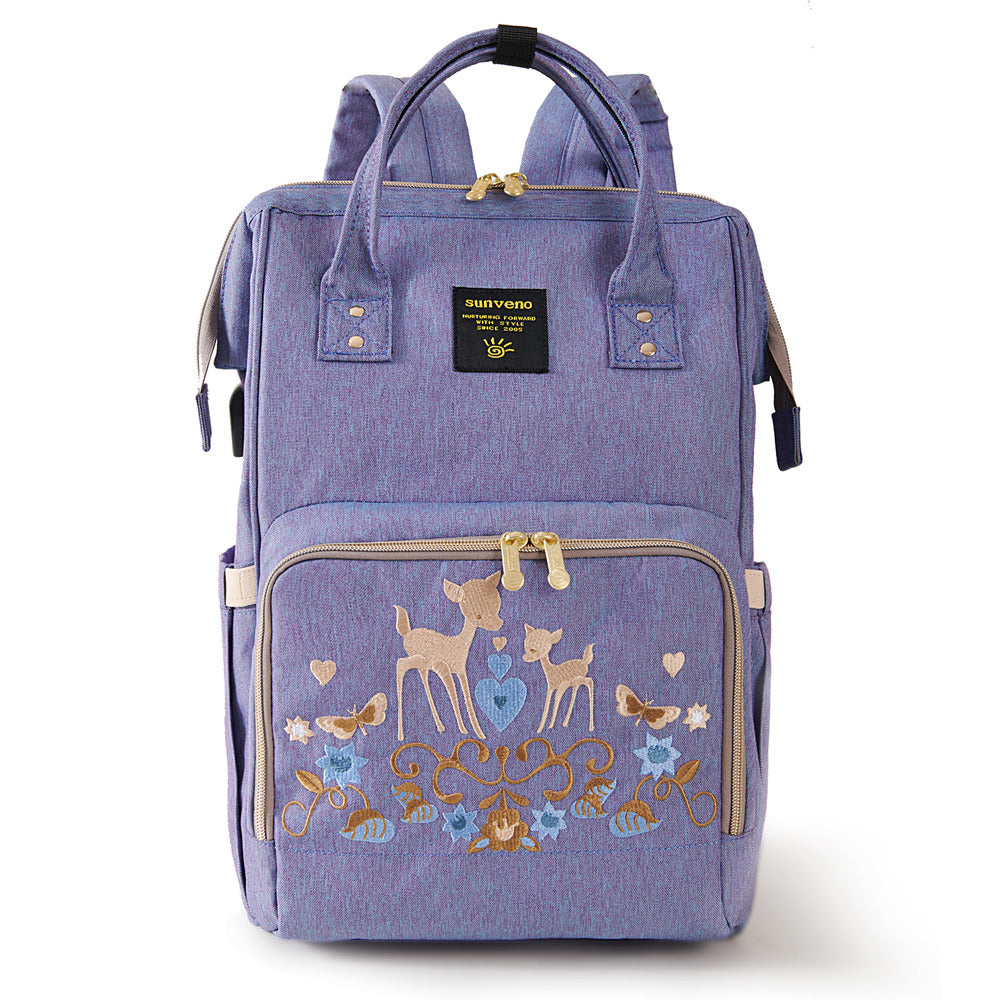 Back view of SUNVENO Flower-Embroidered Diaper Backpack highlighting durability