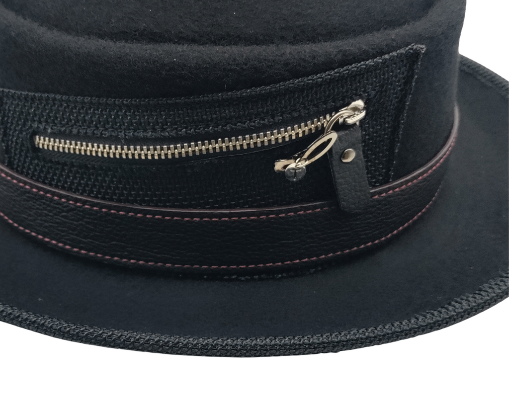 Stylish Aston Custom Zipper Pork Pie Hat worn outdoors in winter by Scarves & Fedoras
