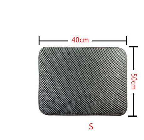 Ultimate Clean Paws Cat Litter Mat with cat playing beside it