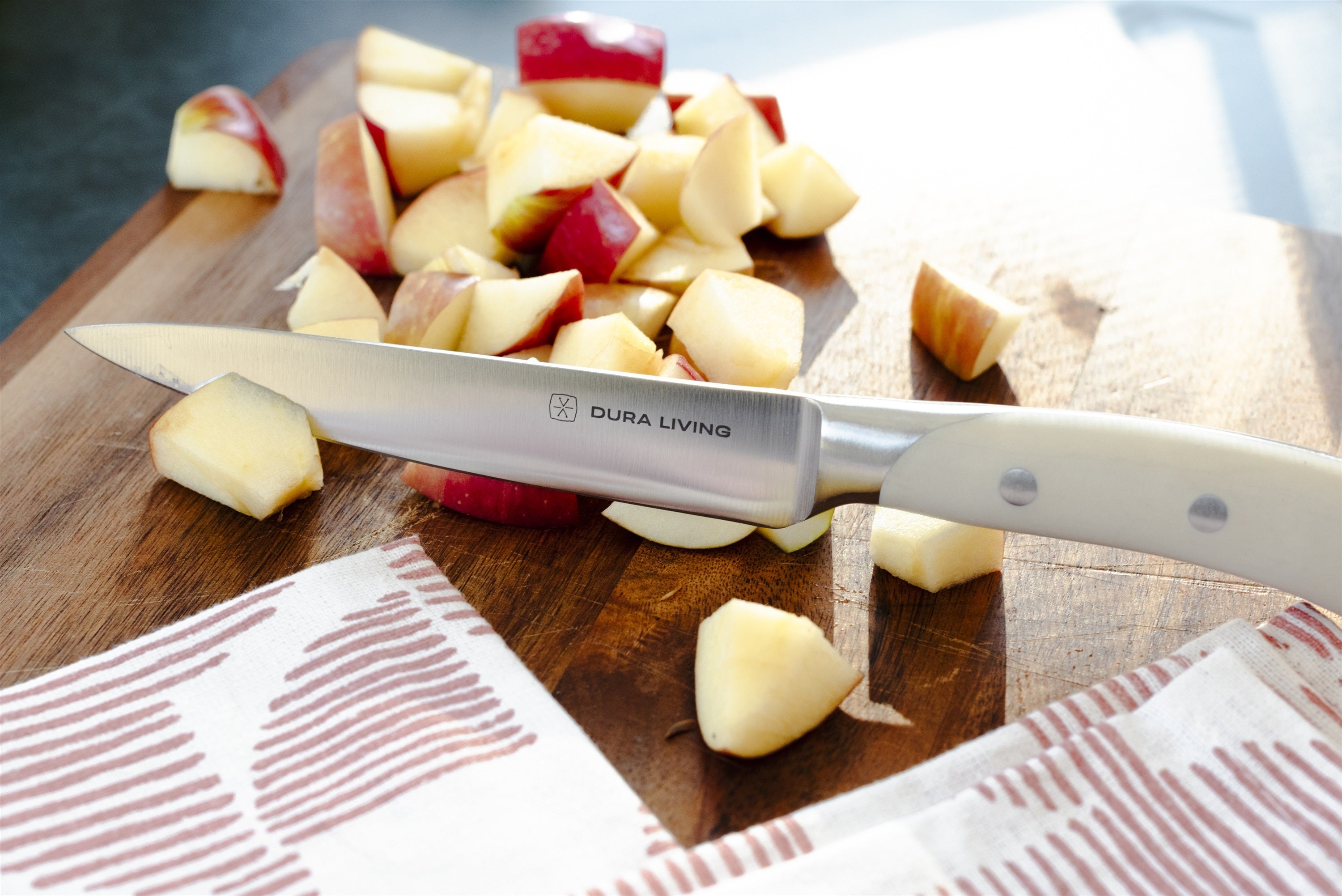 Dura Living Elite Kitchen Knife Set in action cutting fresh vegetables