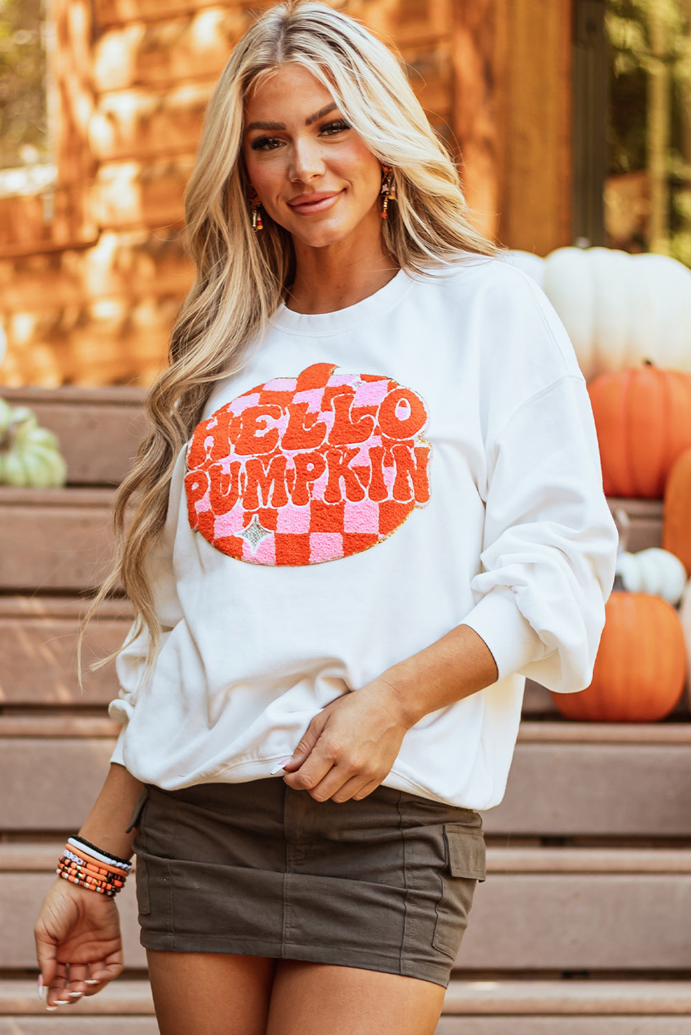 Side view of cozy Blair Pumpkin Pullover Sweatshirt in festive style