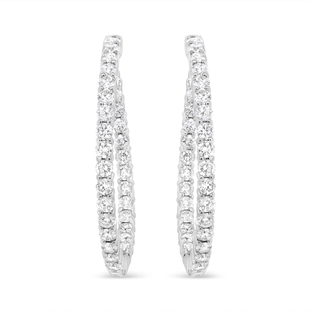 Side view showcasing the unique curve of 18K White Gold Earrings