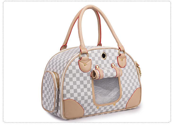 Stylish Luxury Leather Pet Tote being carried by a pet owner