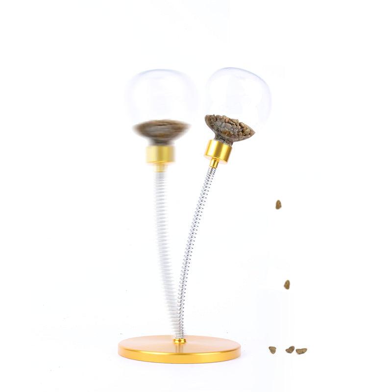 Interactive Pet Leak 'N Swing Ball Toy for Cats in vibrant yellow by Dog Hugs Cat