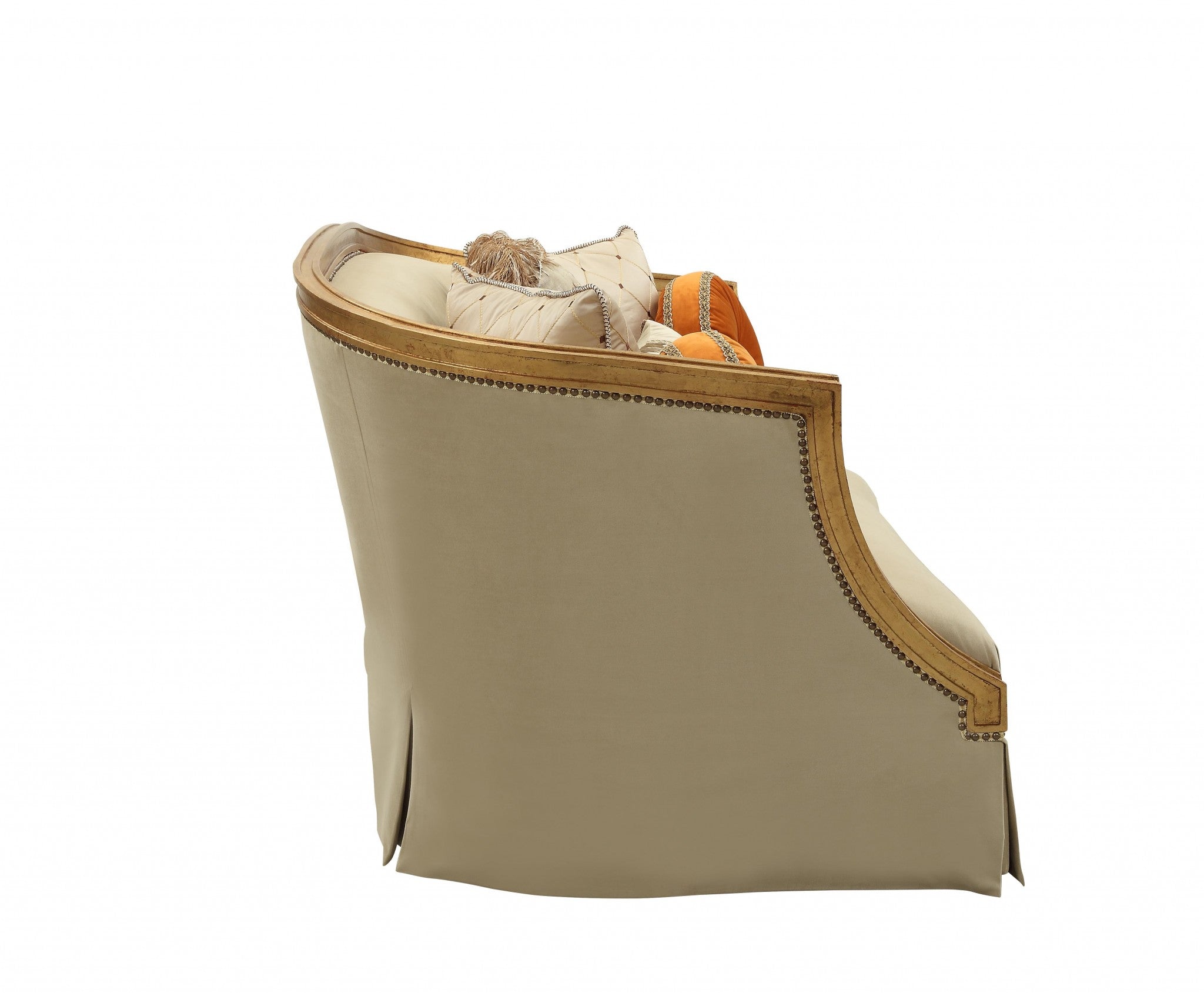 Close-up of toss pillows on Tan and Gold Curved Loveseat