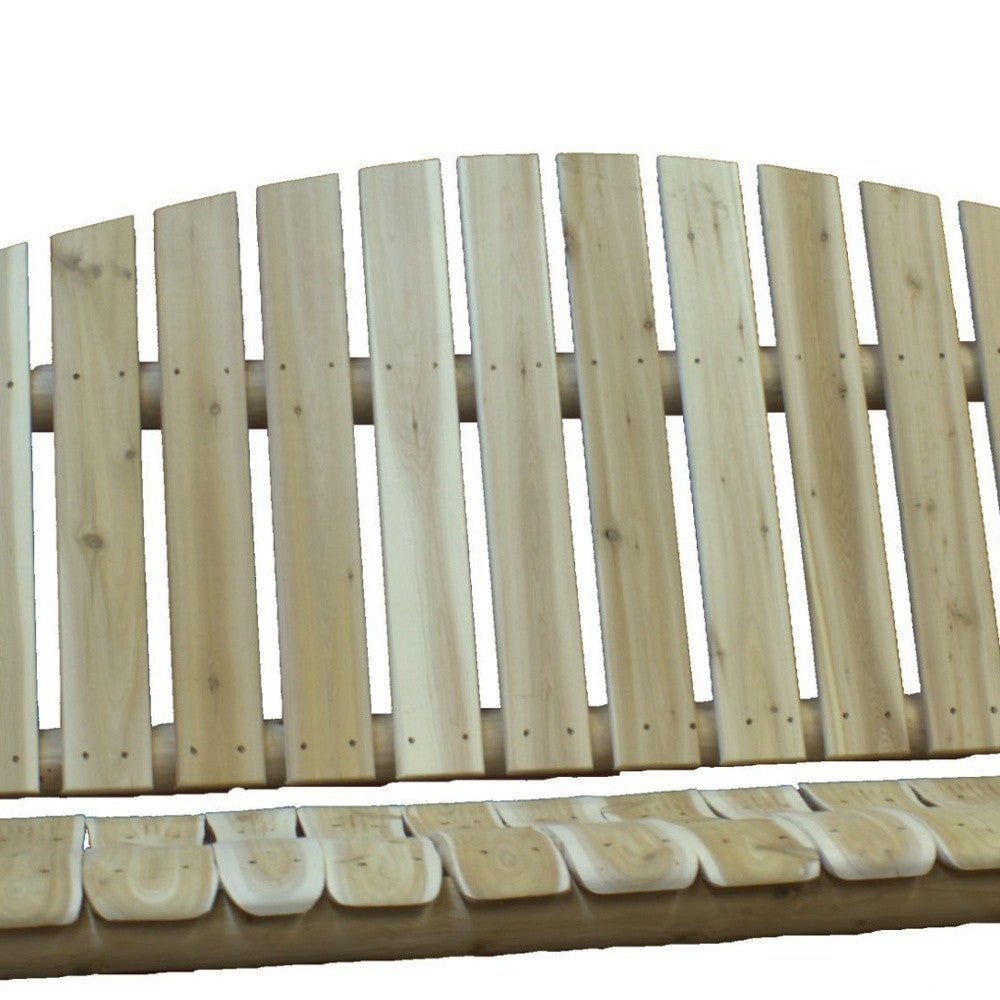 Relaxing outdoors in the 71-Inch Natural Solid Wood Swing Chair