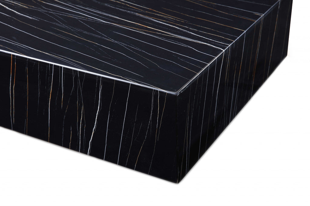 35" Black Marble Square Coffee Table set in a cozy bedroom setting