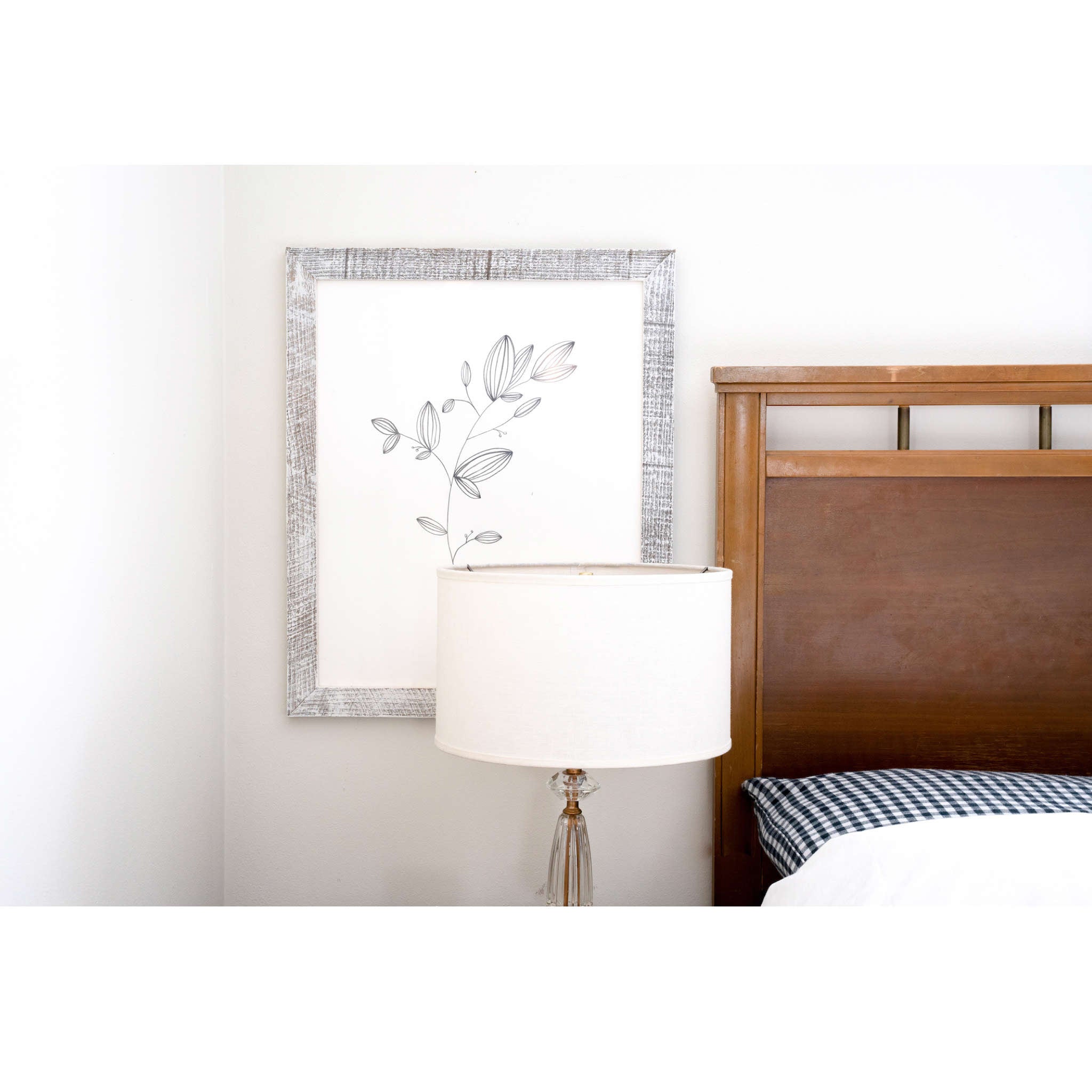 24" x 36" White Solid Wood Picture Frame styled with artwork in a living room