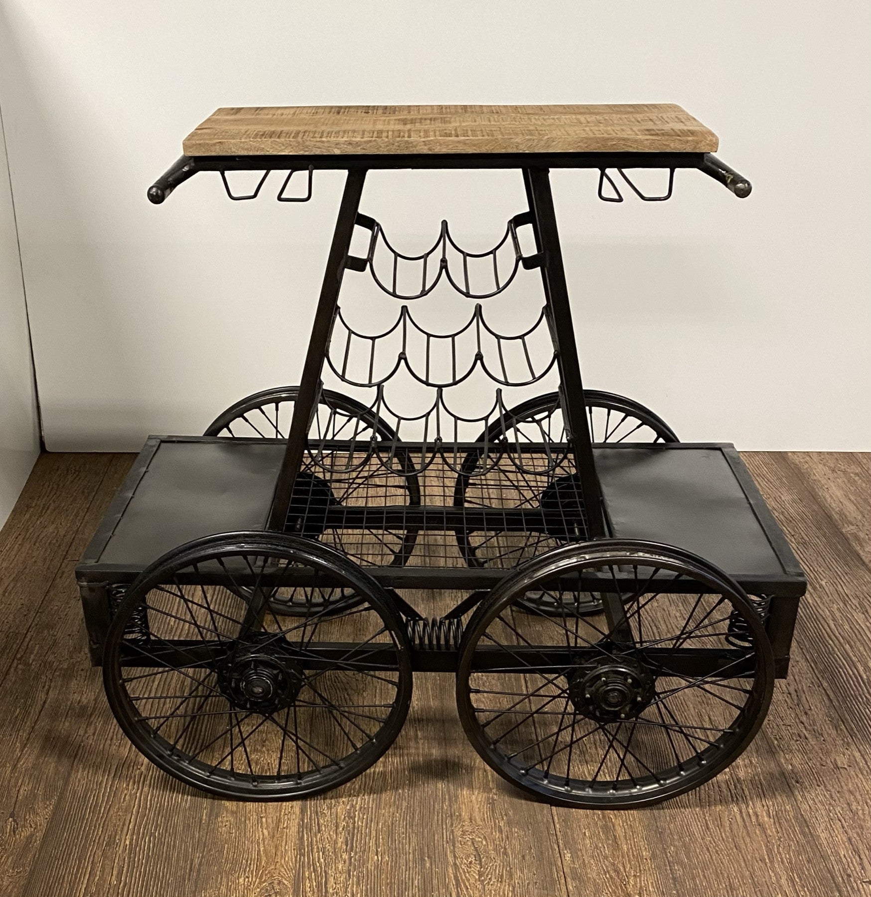 Side view of Vintage Industrial Black Rail Car Bar Cart by Homeroots