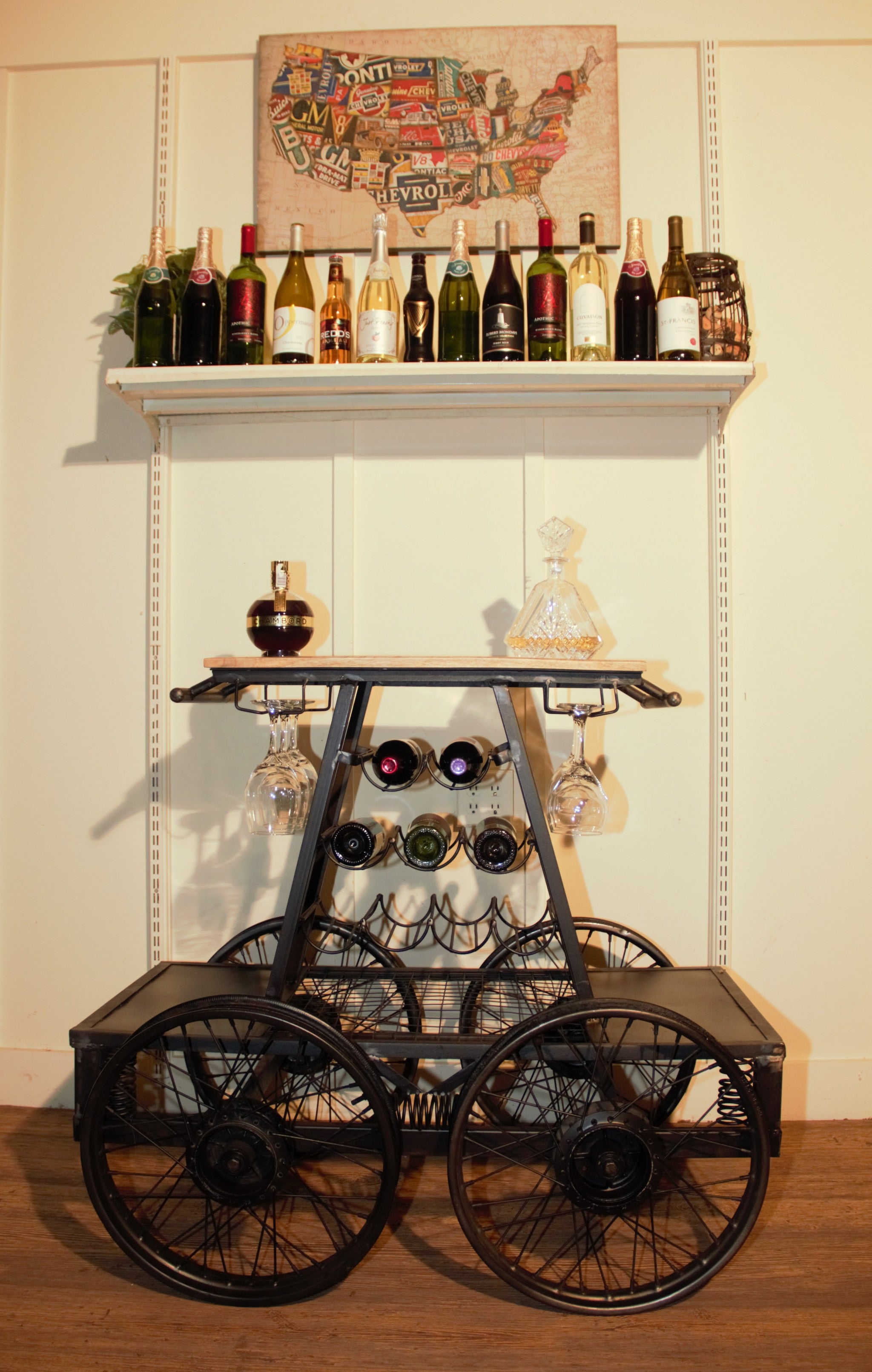 Lifestyle image of the Vintage Industrial Black Rail Car Bar Cart in use