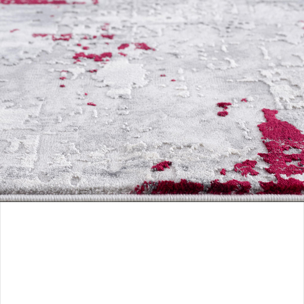 9' x 13' Red and Gray Abstract Area Rug on hardwood floor