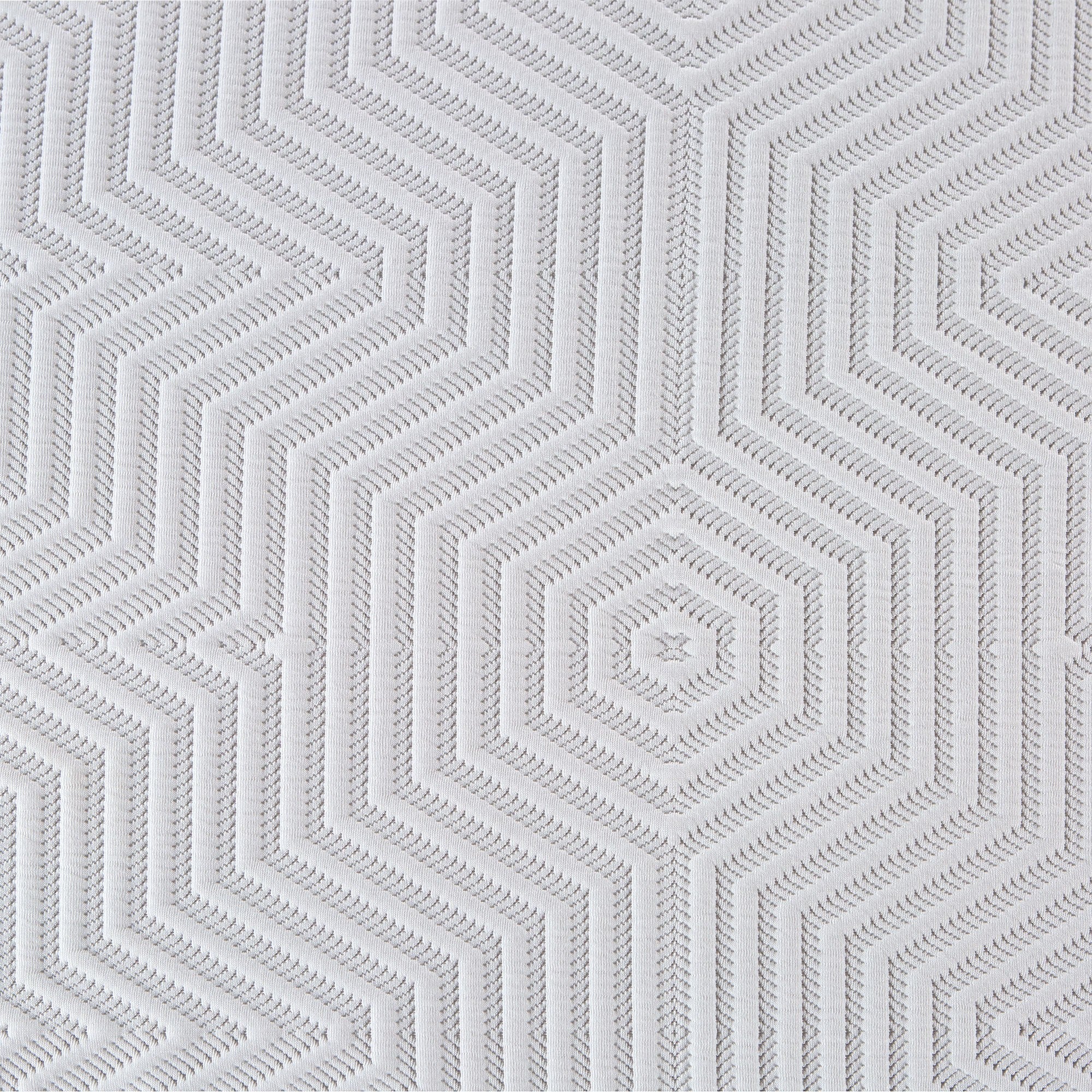 Close-up of quilted top fabric of 13" Hybrid Pocket Coil Gel Memory Foam Mattress