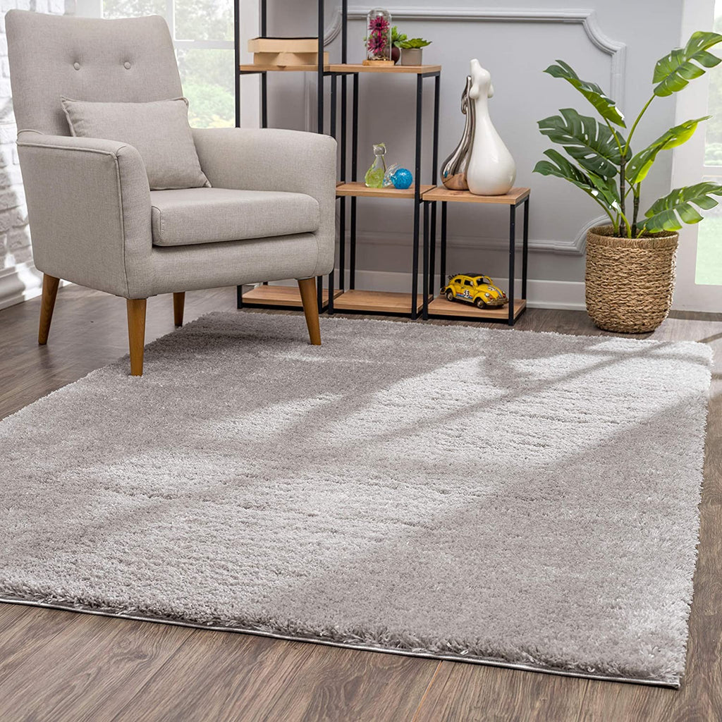 7' X 9' Ivory Modern Solid Shag Area Rug