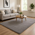 Front view of 8' x 11' Ivory Modern Solid Shag Area Rug by Homeroots