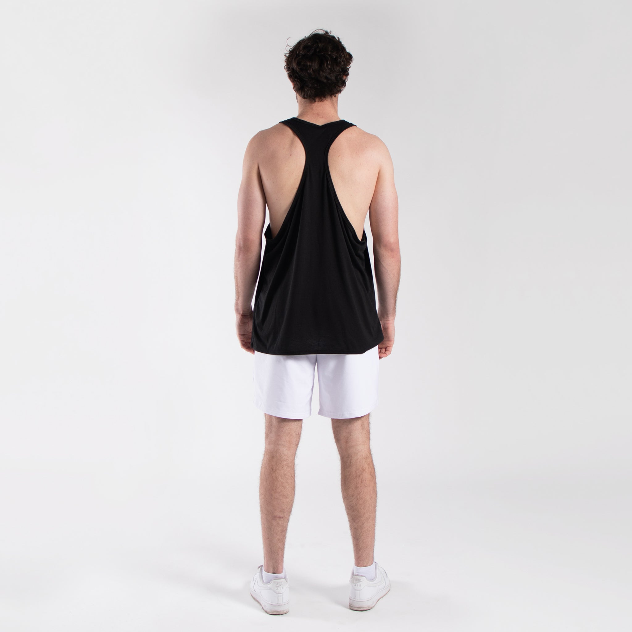 Back view of Men's Lightweight Racerback Stringer Tank highlighting racerback design