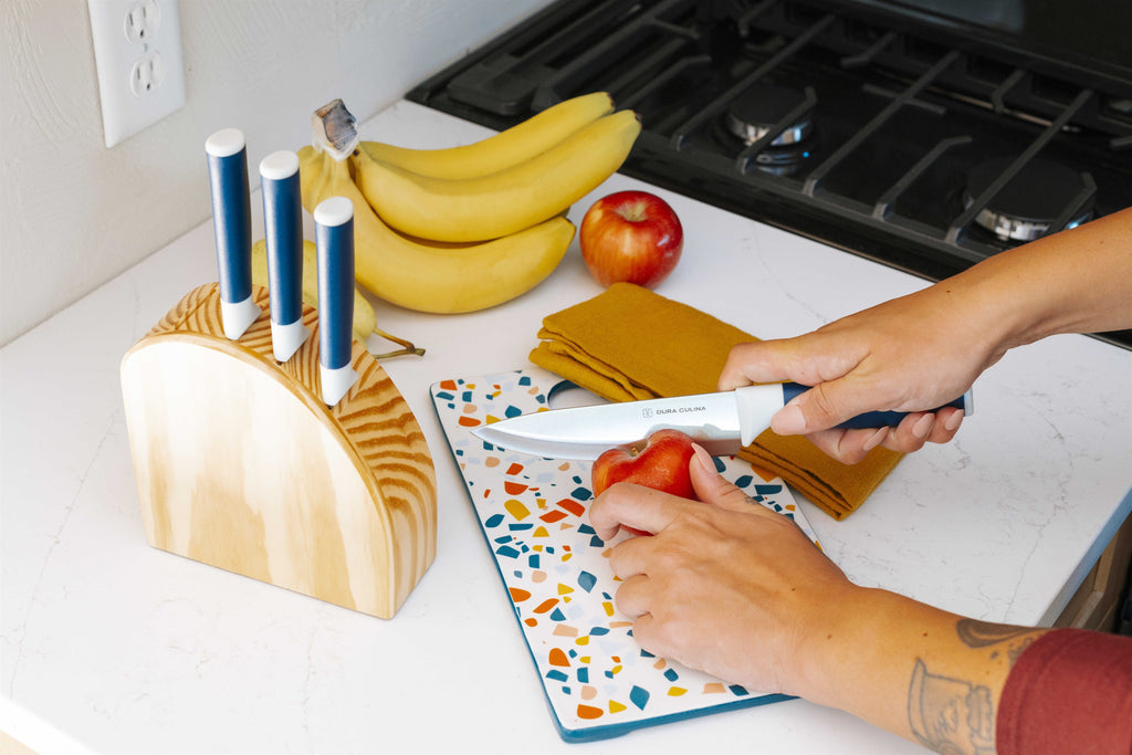 Dura Living DUO-GRIP knife set displayed on a wooden kitchen countertop