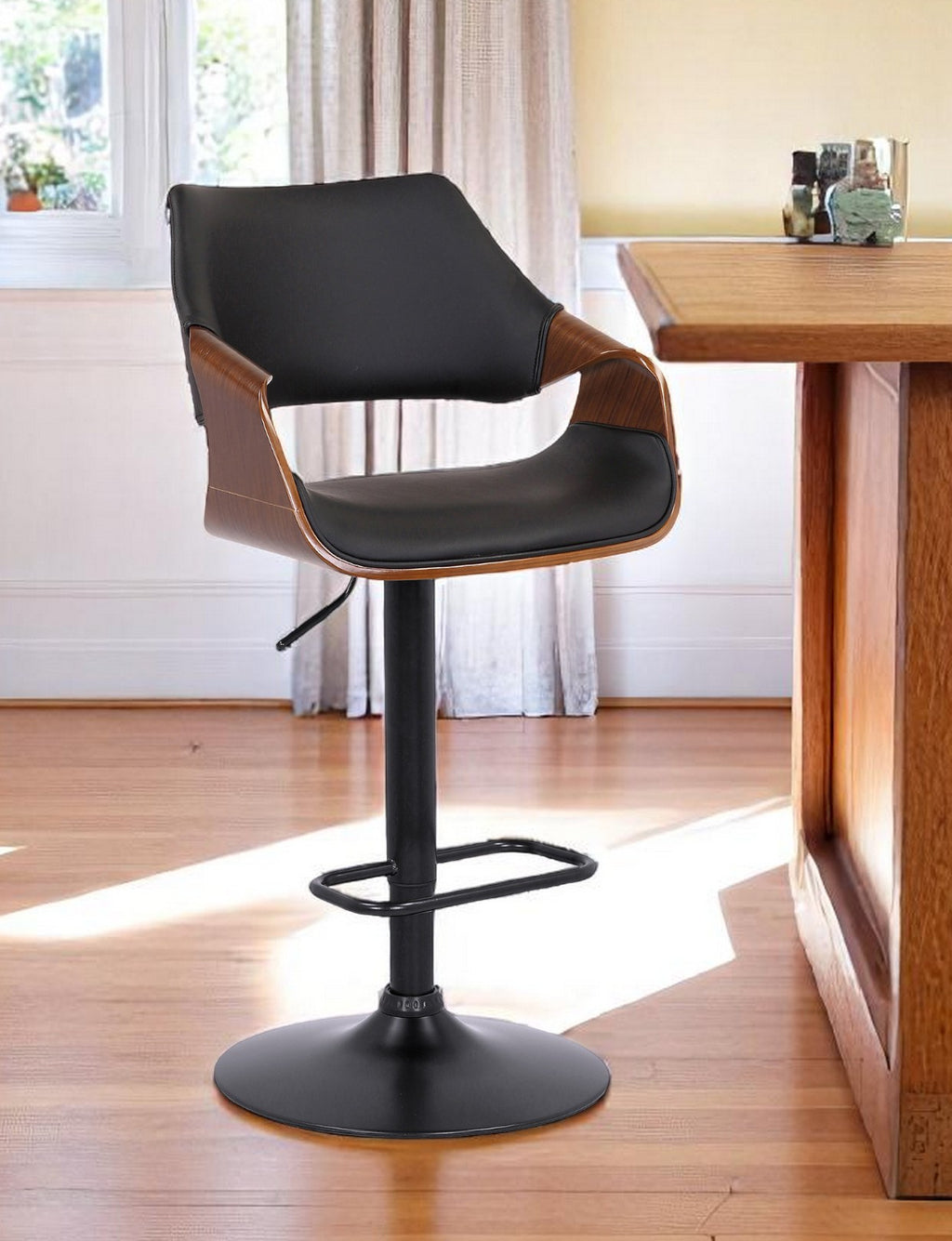 25" Adjustable Black Iron Swivel Bar Chair with matte black base detail