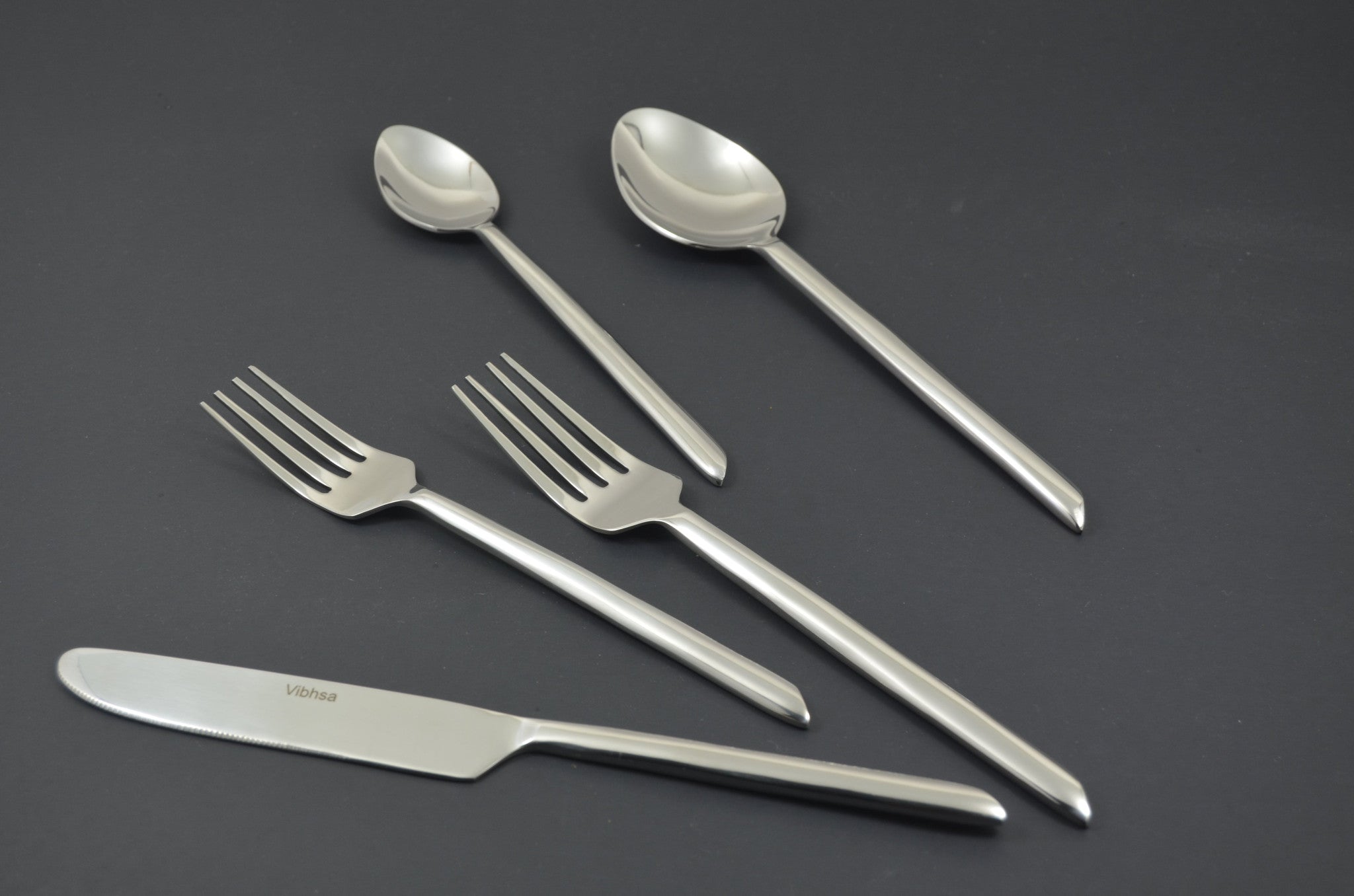 Glossy Silver Stainless Steel Twenty Piece Hand Forged Flatware Set
