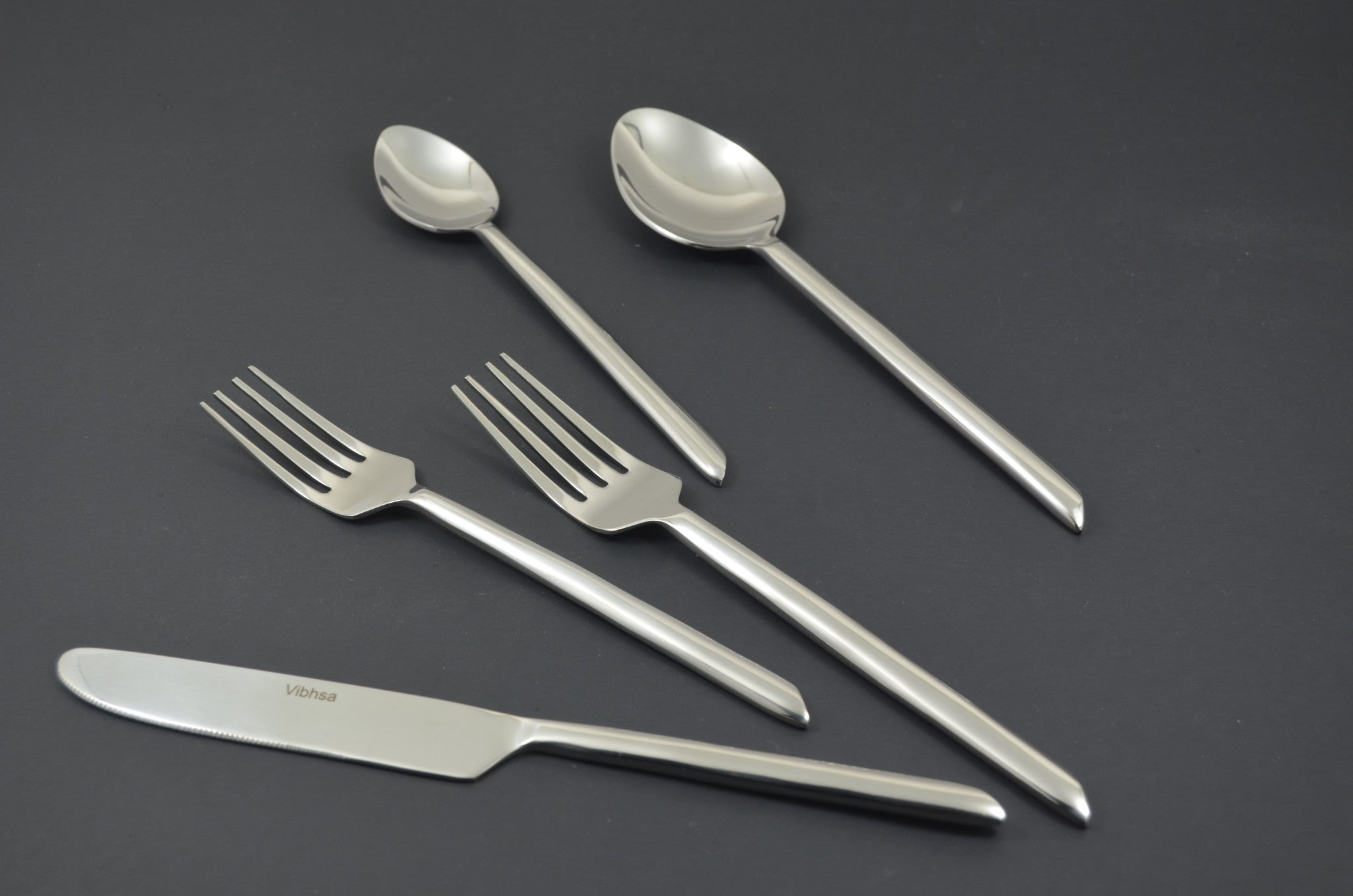 Glossy Silver Stainless Steel Twenty Piece Hand Forged Flatware Set