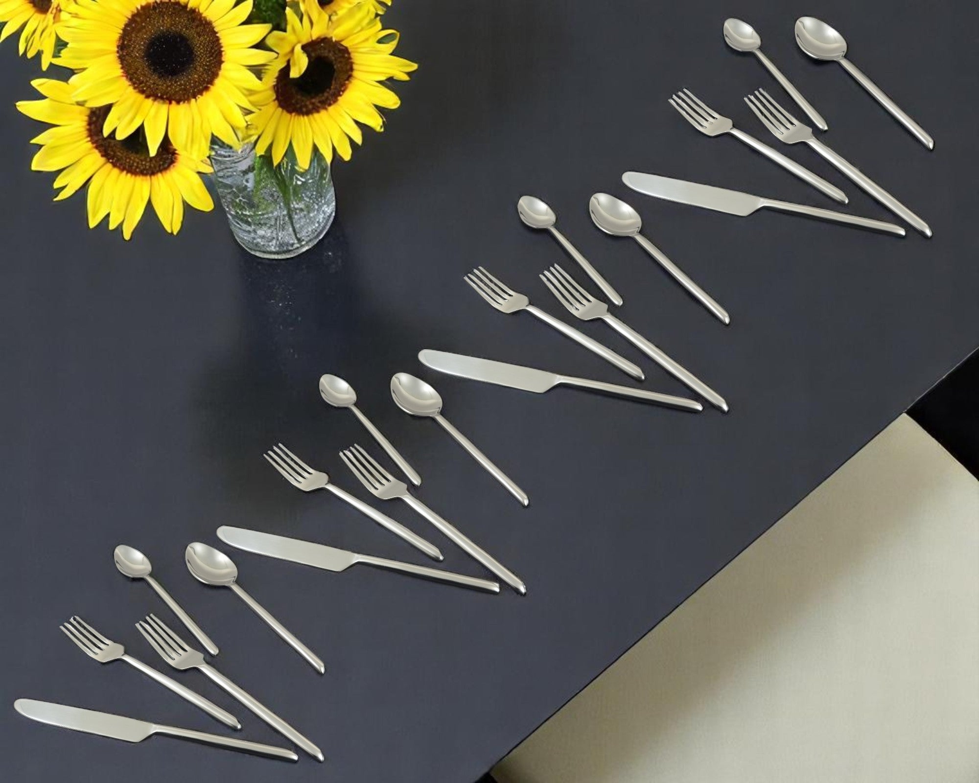 Glossy Silver Stainless Steel Twenty Piece Hand Forged Flatware Set