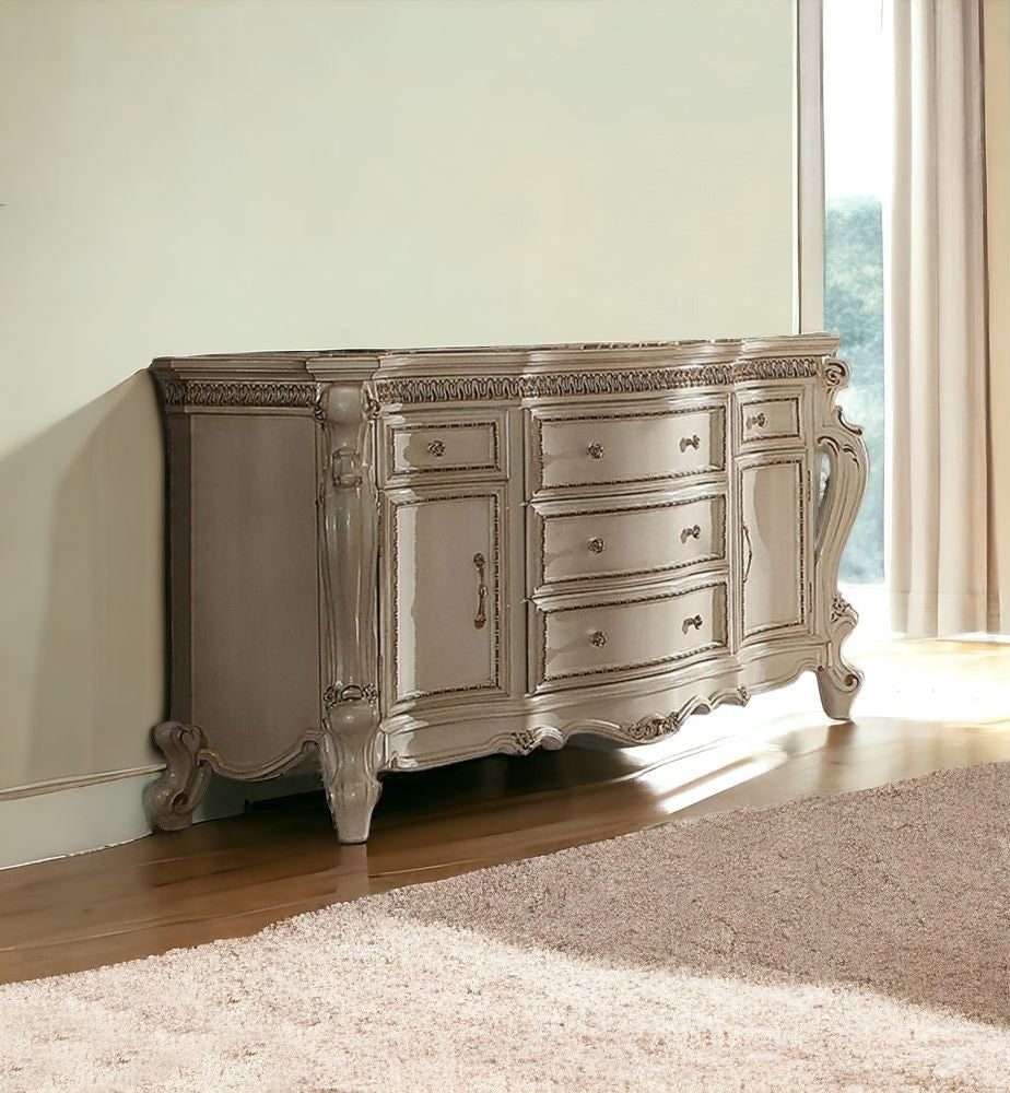 Full room setup featuring the 69-Inch Pearl Triple Dresser in a stylish bedroom