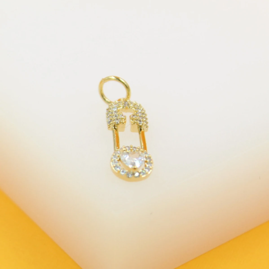 Lifestyle shot of MIA Jewelry 18K Gold Filled CZ Safety Pin Pendant Charm worn