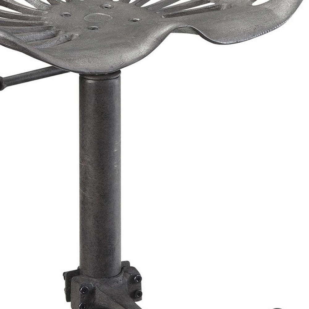 Close-up of the bucket seat on the Gray Iron Adjustable Bar Stool