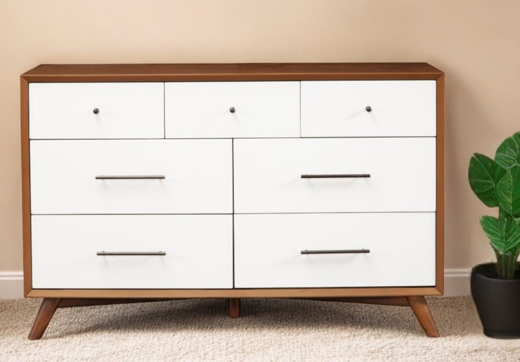 Lifestyle shot of 56" Brown and White Solid Wood Seven Drawer Dresser in modern bedroom