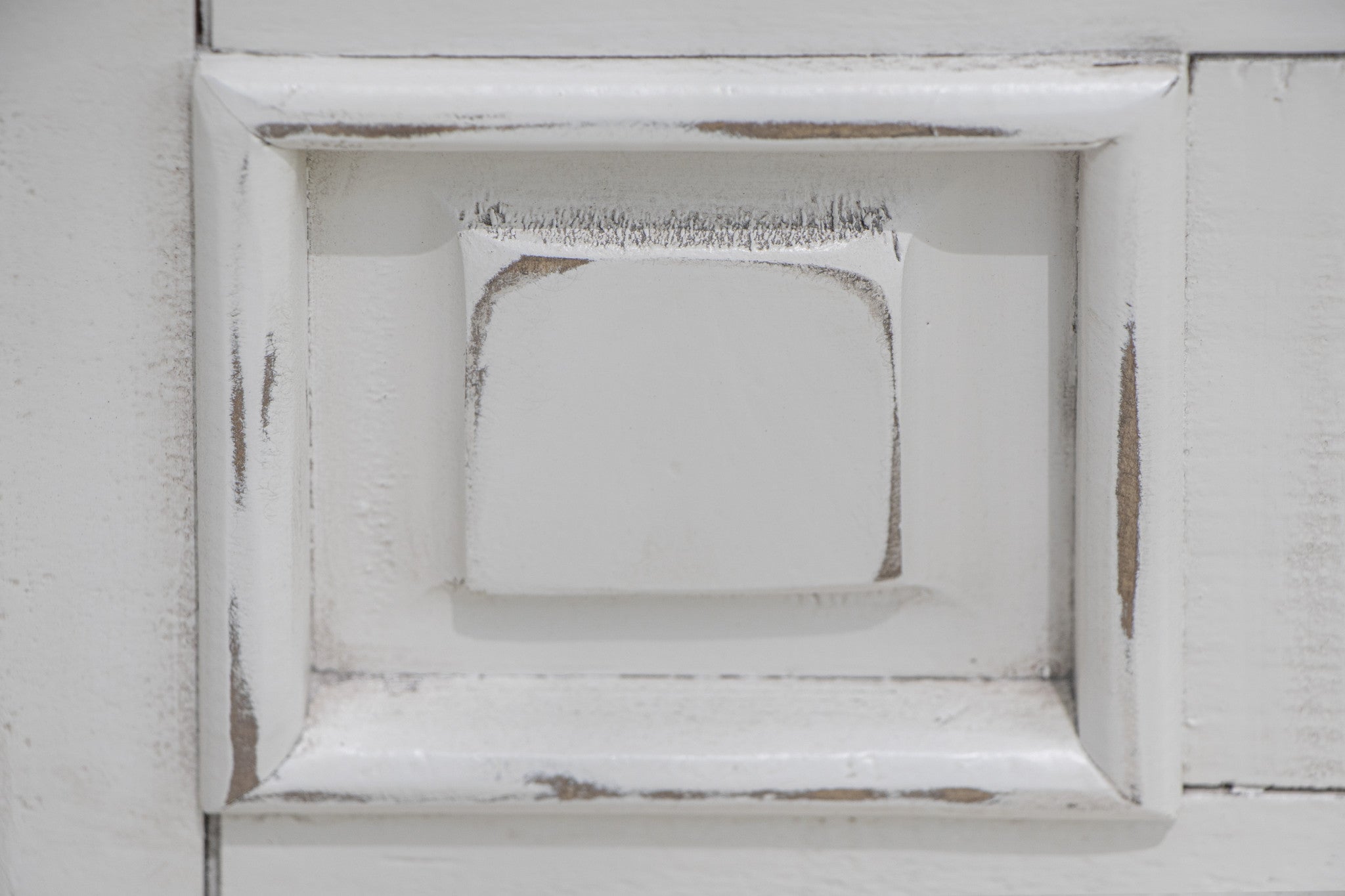 Side angle of the 69" White Solid Wood Triple Dresser showcasing drawers