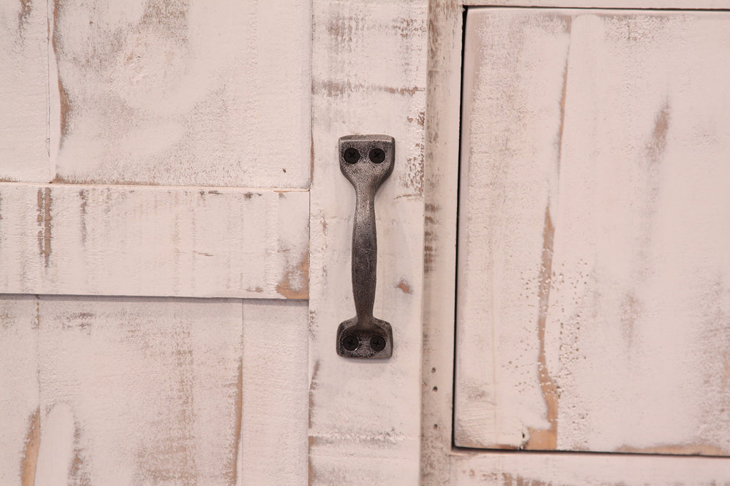 Lifestyle image of 54" Brown and White Solid Wood Four Drawer Dresser in a cozy bedroom