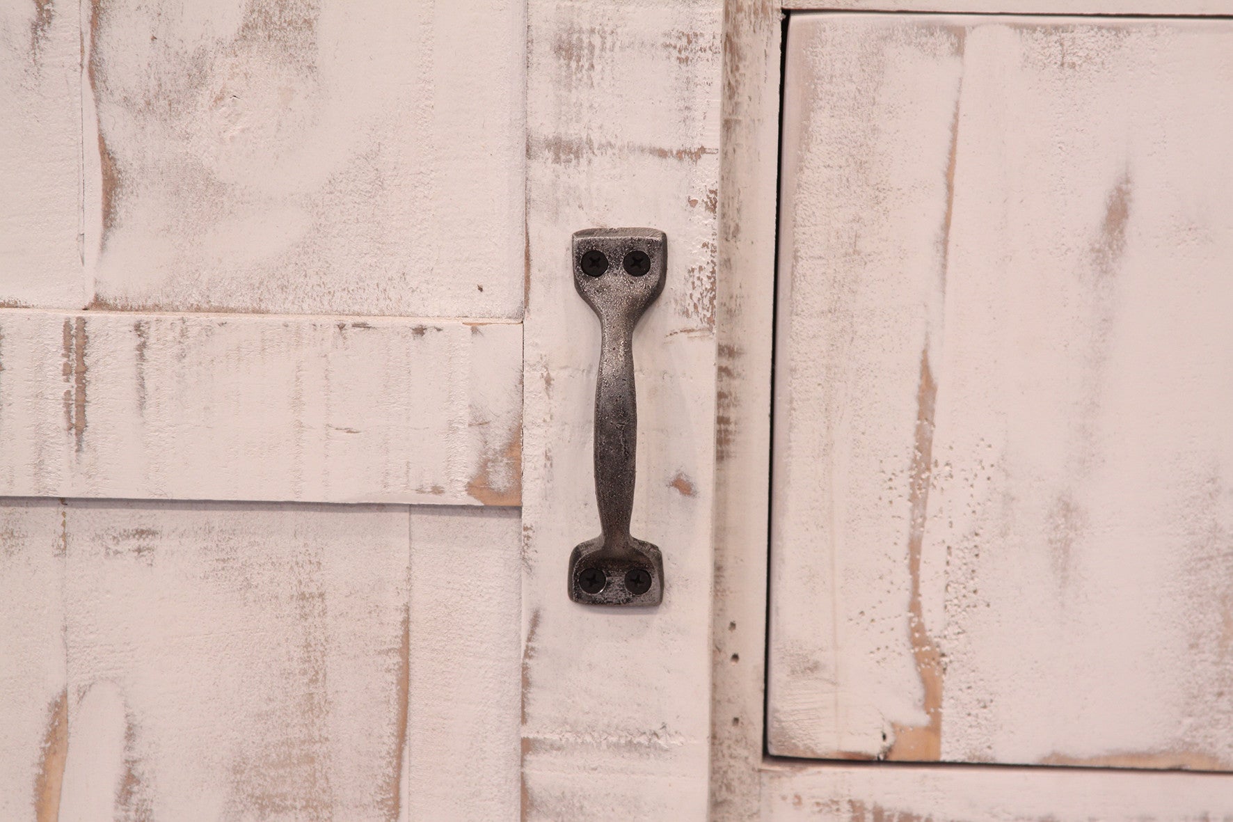 Lifestyle image of 54" Brown and White Solid Wood Four Drawer Dresser in a cozy bedroom