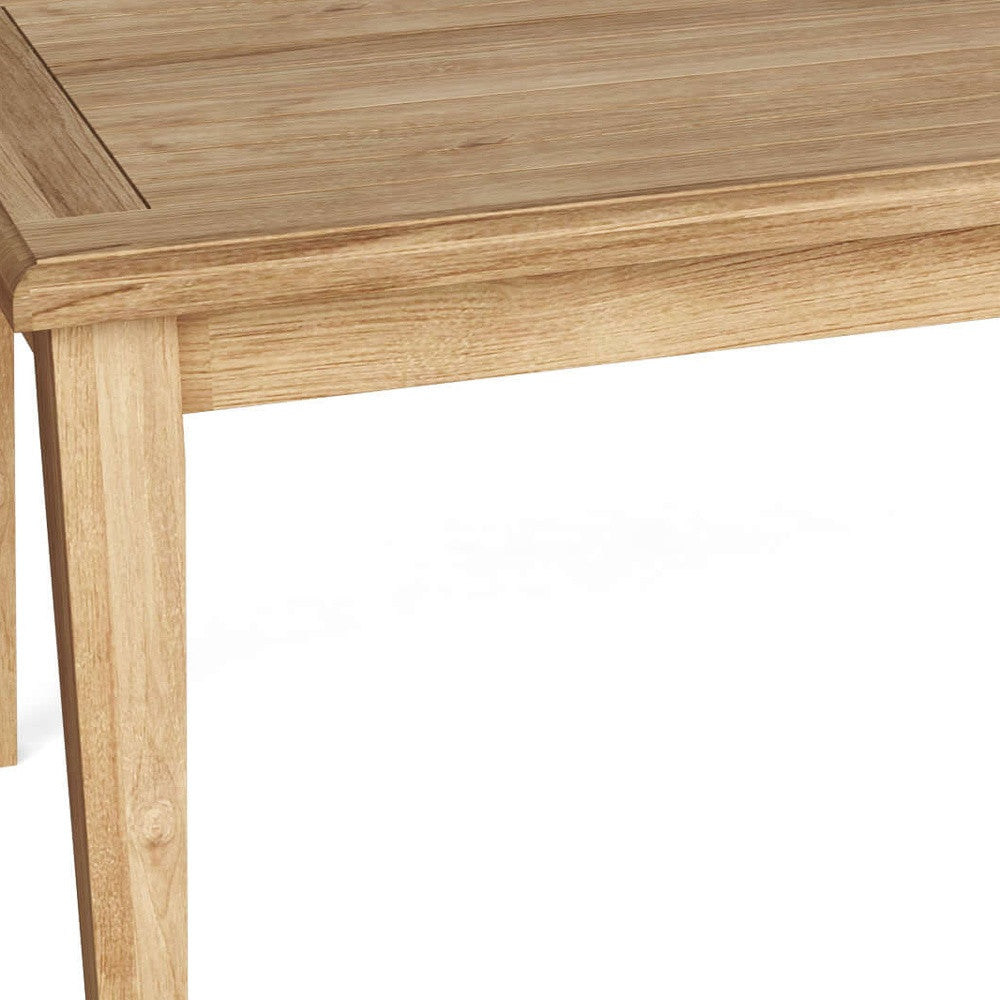 Detailed view of the sturdy legs of 47" Solid Wood Outdoor Coffee Table