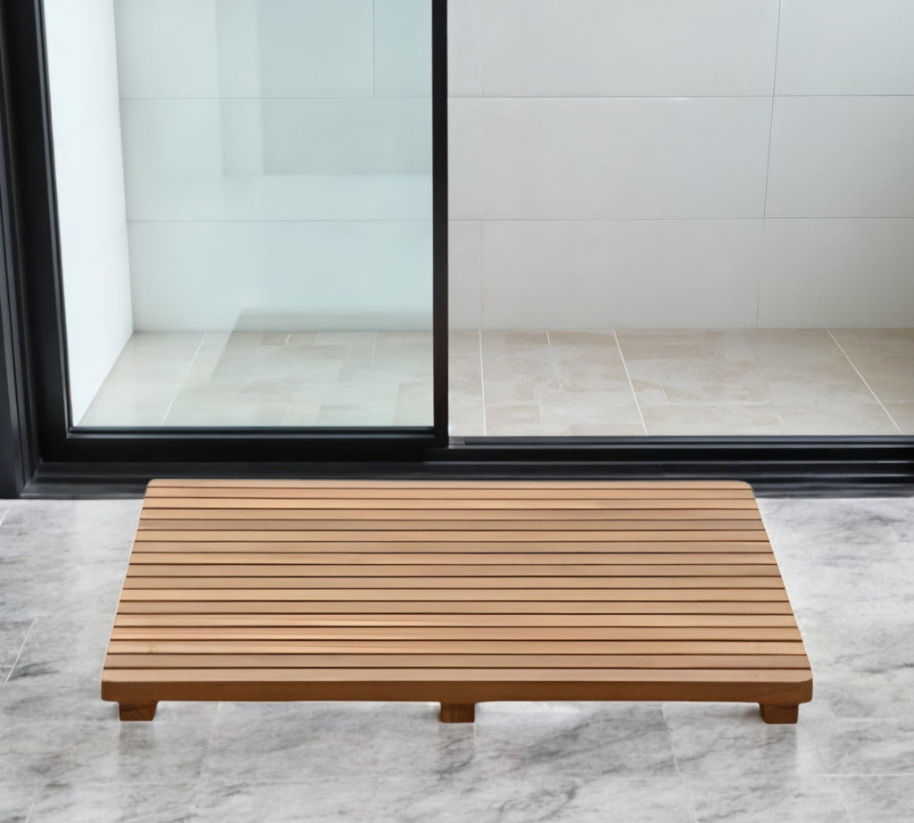 Premium 24" Teak Shower Mat displayed with bath essentials