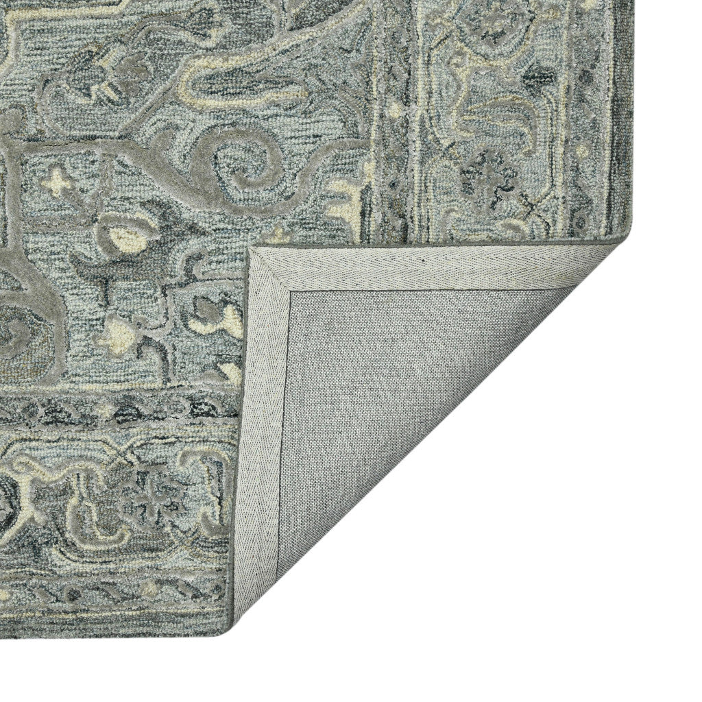 5' X 7' Gray Ivory And Light Blue Wool Oriental Hand Tufted Area Rug